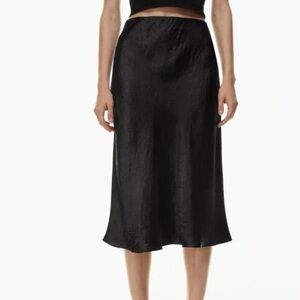 Babaton Aritzia Slip Satin Midi Skirt in black